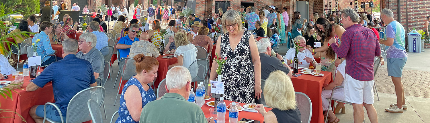 People eating and drinking at a group event